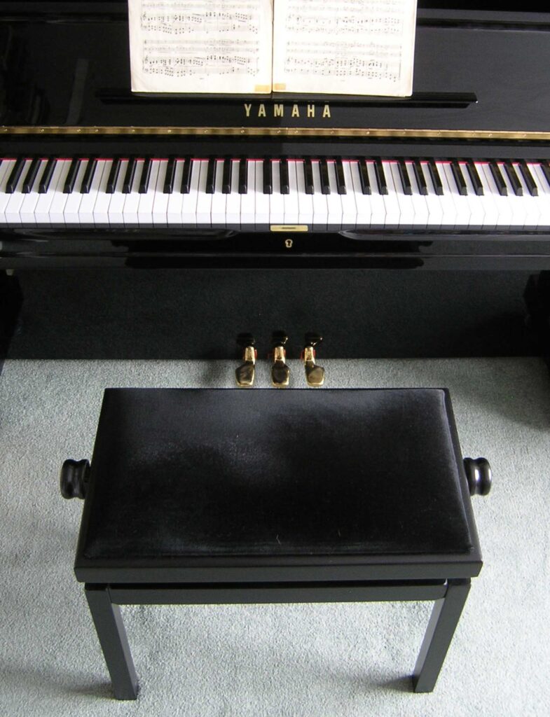 Piano stool and piano.